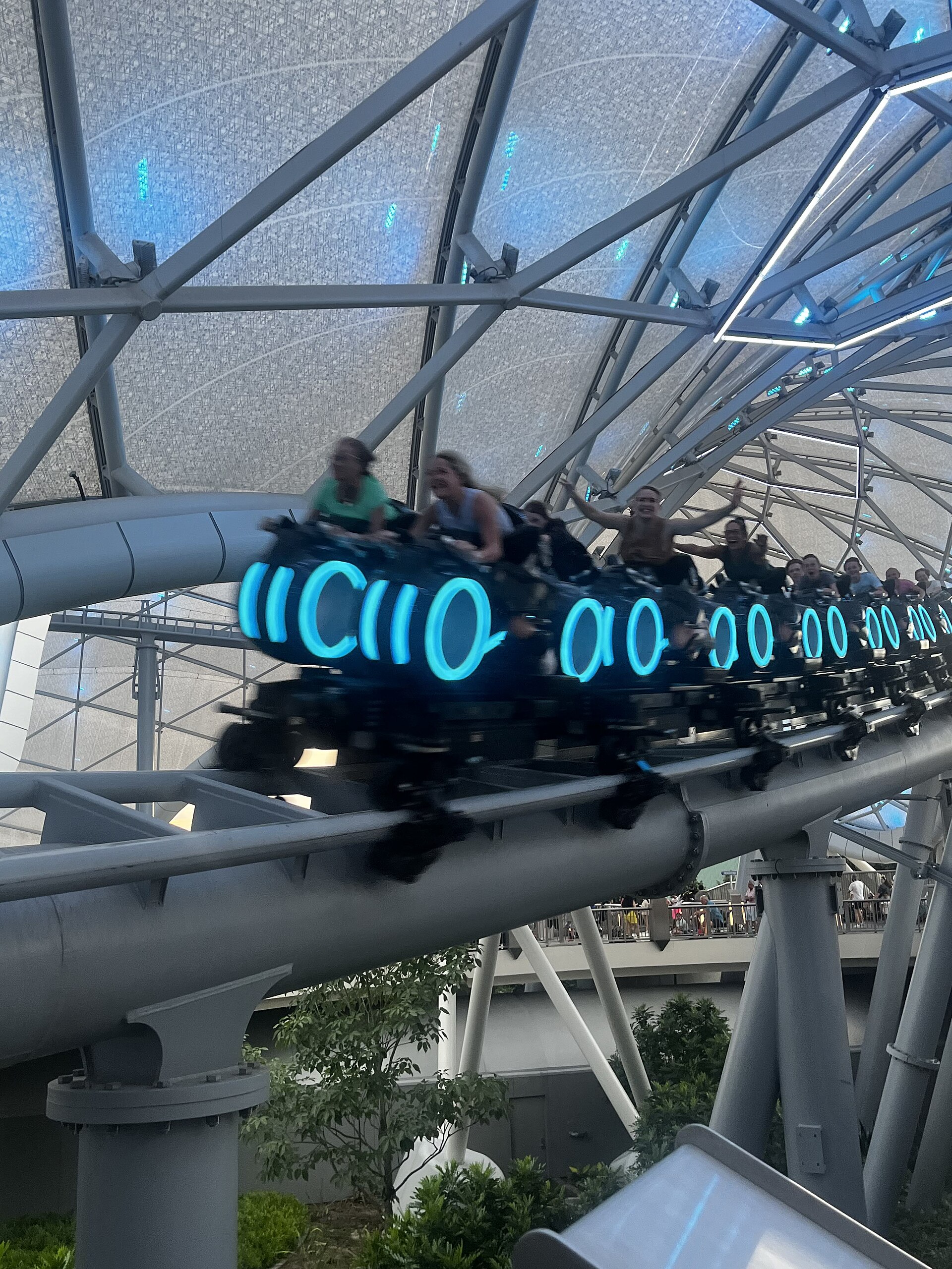 Guests riding TRON Lightcycle Power Run at Shanghai Disneyland